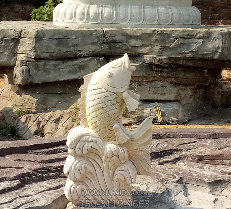 公園里擺放的漢白玉石雕創意噴水雕塑