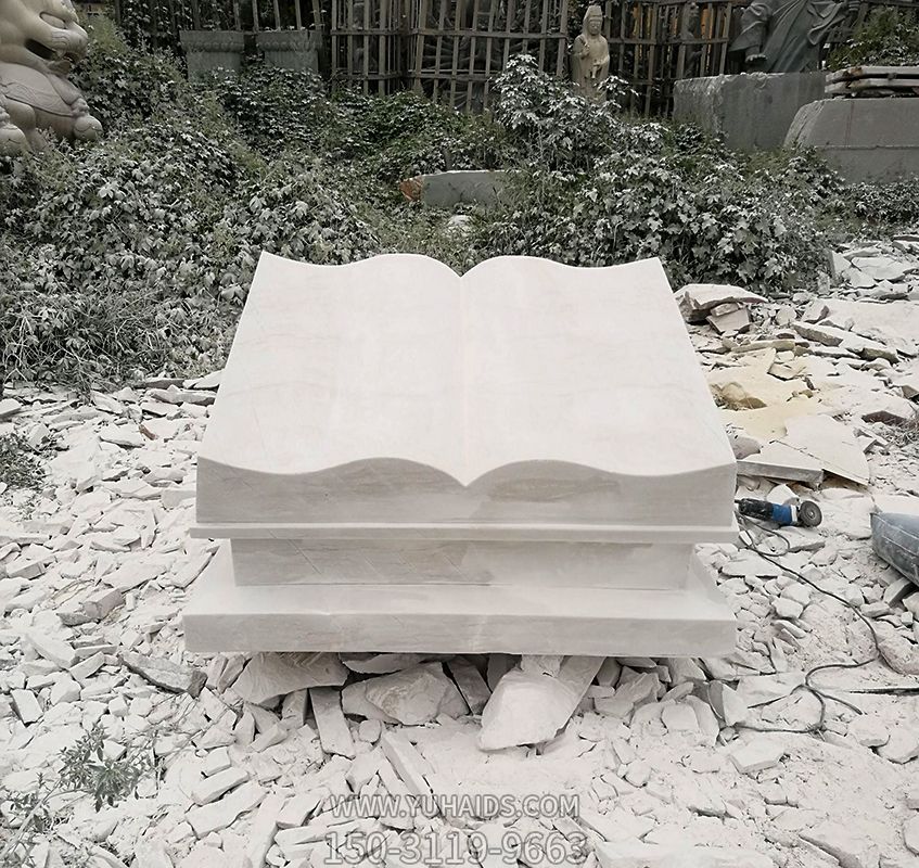 公園漢白玉創(chuàng)意書(shū)雕塑