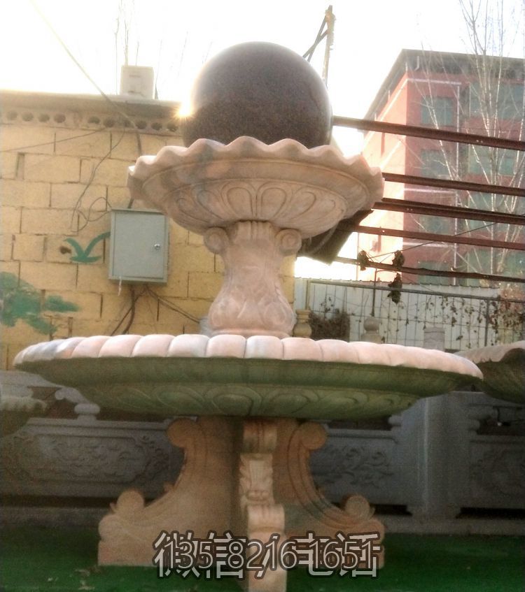 晚霞紅石雕風水球噴泉