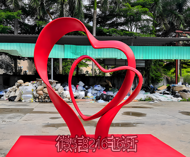 一大一小愛心造型不銹鋼飄帶雕塑
