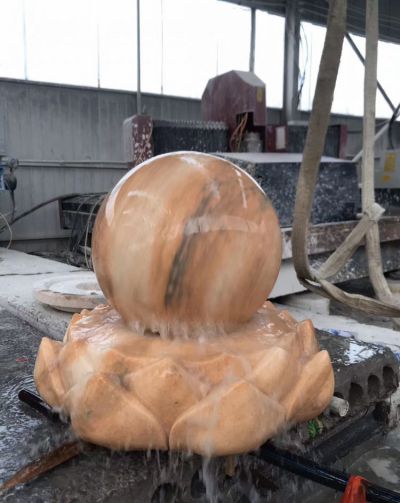 晚霞紅風水球石雕