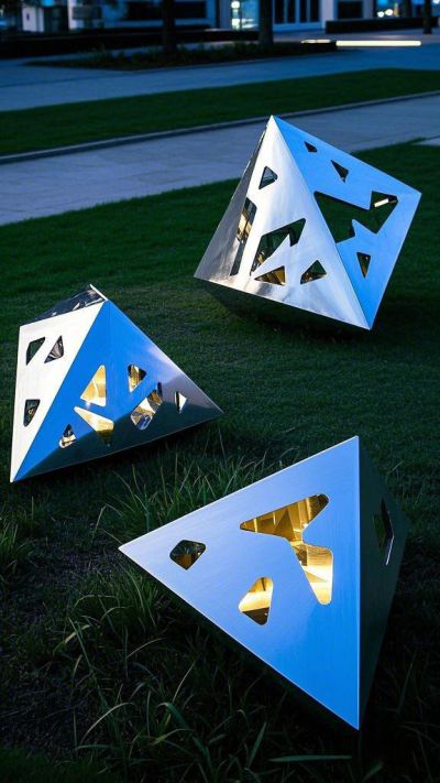 鏡面鏤空發光不銹鋼幾何石頭雕塑